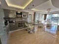 Купить трехкомнатную квартиру, 124 м², этаж 1 из 4. Фото 1