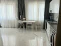 Продажа двухкомнатных апартаментов, 65 м², этаж 5 из 9. Фото 3